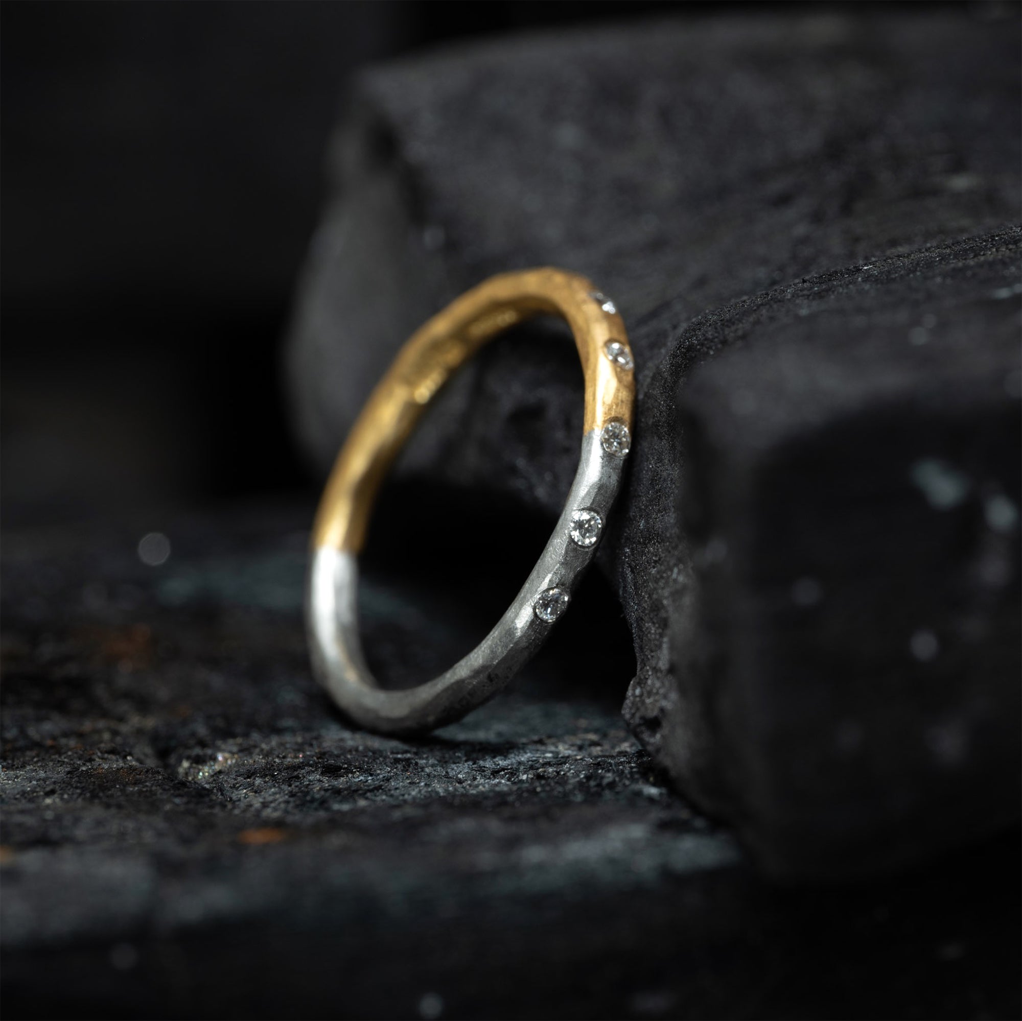 platinum and gold flush set diamond ring