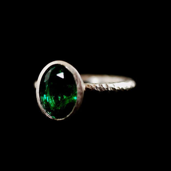 Pinched Platinum Oval Emerald Ring