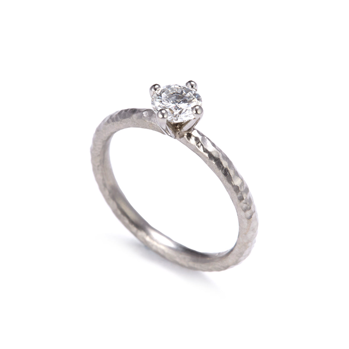 Pinched Platinum Claw Set Diamond Ring