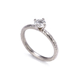 Pinched Platinum Claw Set Diamond Ring