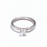 Pinched Platinum Claw Set Diamond Ring