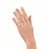 Pinched Platinum Claw Set Diamond Ring