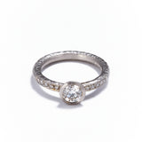 Pinched Platinum Diamond Ring with Shoulder Diamonds