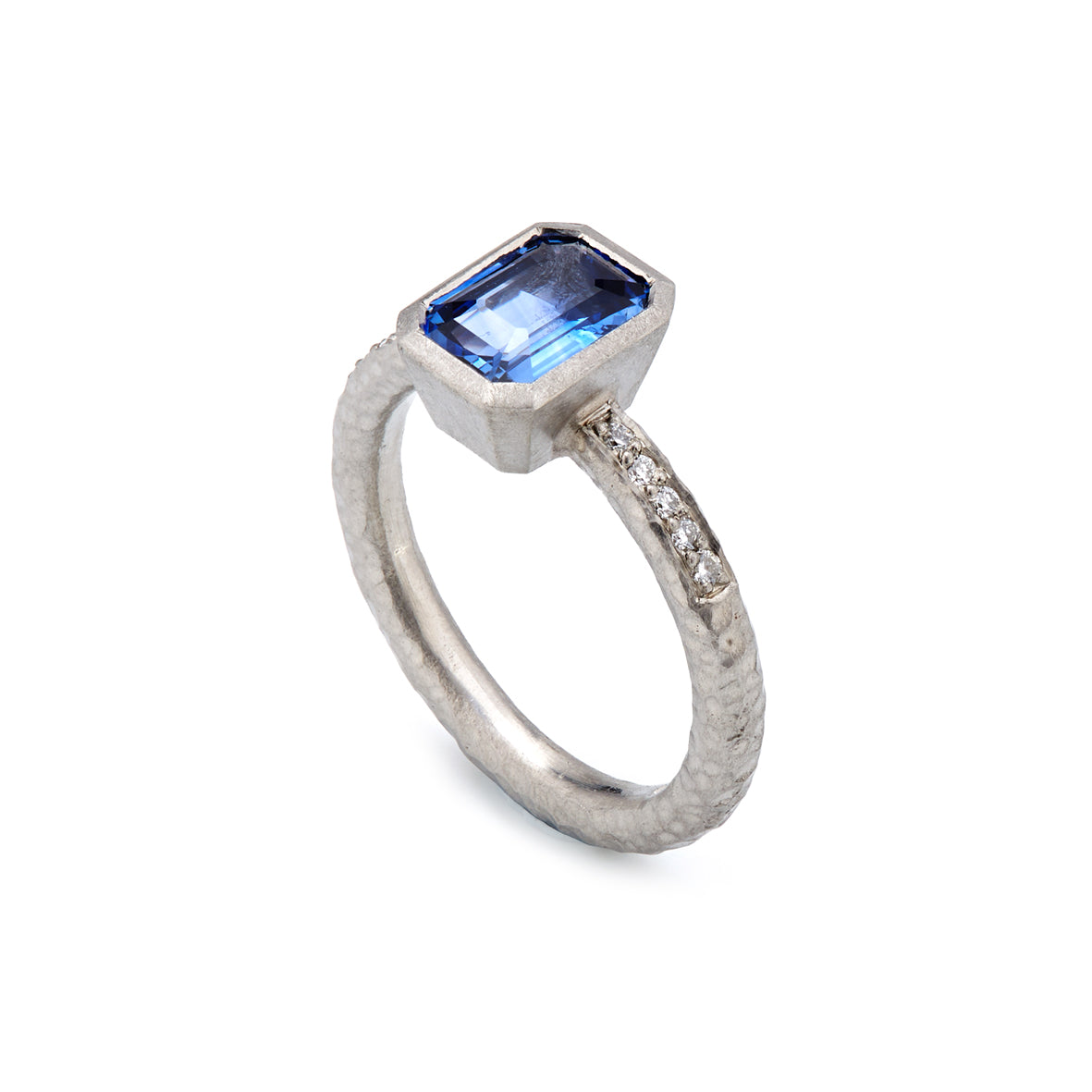 Pinched Platinum Emerald Cut Sapphire Ring