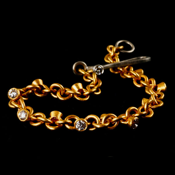 Gold Diamond Charm Bracelet with Platinum Catch
