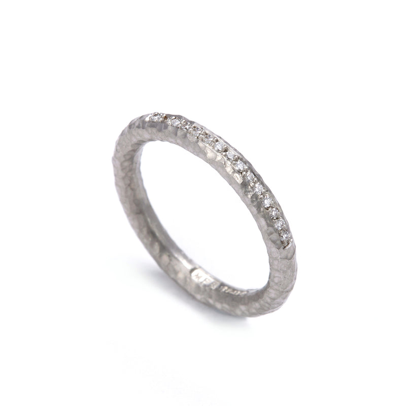 Pinched Platinum Channel Set Diamond Ring