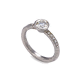 Pinched Platinum Diamond Ring with Shoulder Diamonds